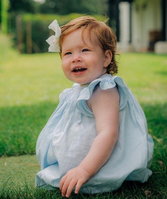 Princ Harry a Meghan zverejnili fotografiu dcéry Lilibet