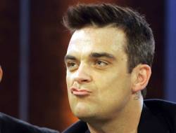 charizmaticky spevak robbie williams