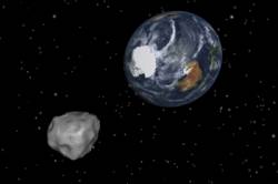 zem minul velky asteroid