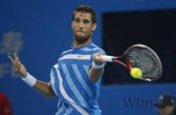 martin klizan v pekingu vyradil rafaela nadala