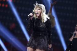 music_taylor_swift_45900 23424c7cc80d4fafa6f2b83cf4ce8d32 676x451