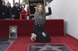 rita_wilson_honored_with_a_star_on_the_hollywood_walk_of_fame_60237 7ca44d5b02a74eeaadea4aa5ae0732cd 676x449