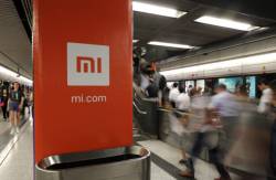 hong_kong_xiaomi_ipo_05604 4f391f4e522241a4af3ab1e8fec5b404 676x441