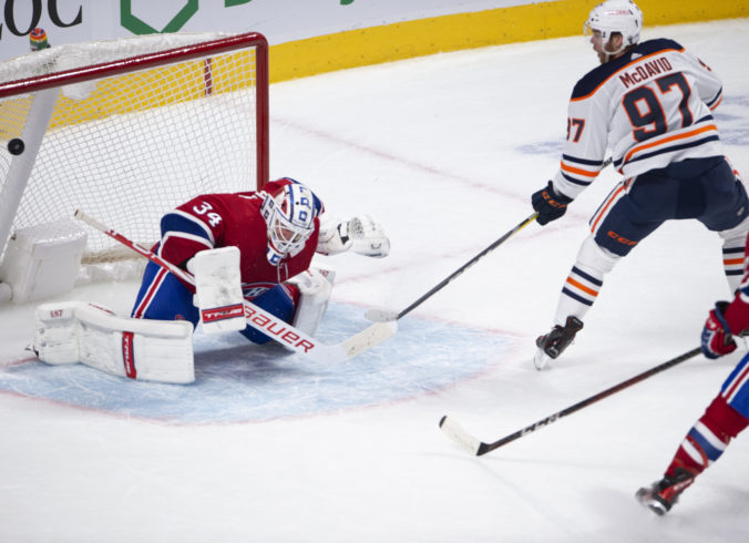 oilers_canadians_hockey_25074 e53e1f351bda41599e3f62aecef08833 676x490