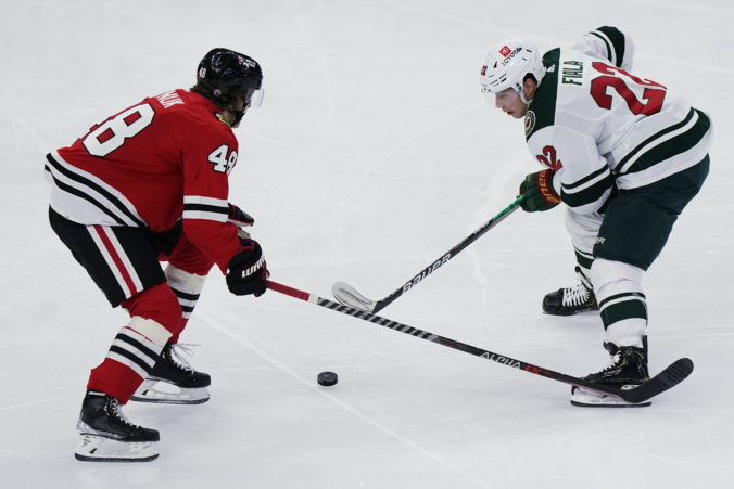 wild_blackhawks_hockey_07794 a4f2fb03e92d45a8820857243728f1ba 676x451