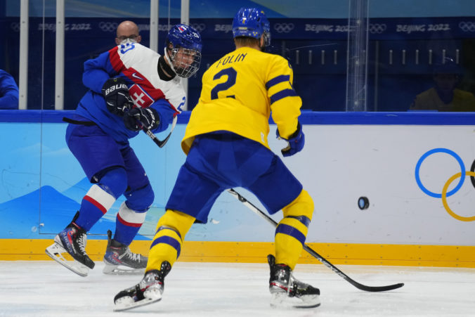 beijing_olympics_ice_hockey_05159 5981a08cfbb442d694ffa9d0ae732706 676x451