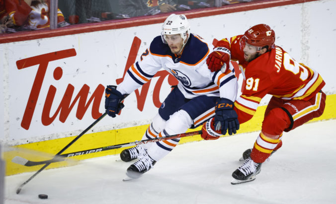 oilers_flames_hockey_35780 626cac664e014c64aad1bee98cf7ba96 676x411