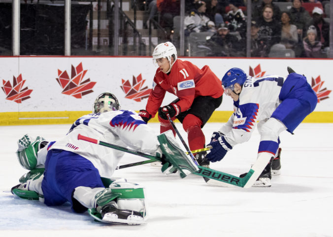 world_juniors_slovakia_switzerland_hockey_81701 d2bf7d52374843979dd9085c689a6295 676x480