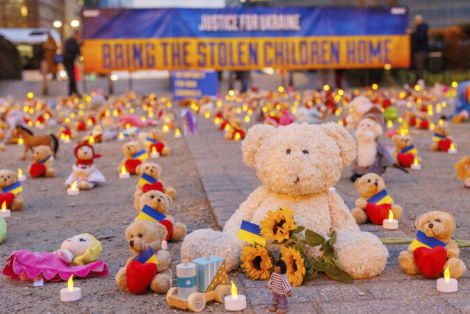 avaaz s_vigil_on_schuman_roundabout_in_brussels_to_call_for_ukraine s_stolen_children_to_be_returned_ _one_year_anniversary_of_russia s_invasion_of_ukraine_84412 1 676x451